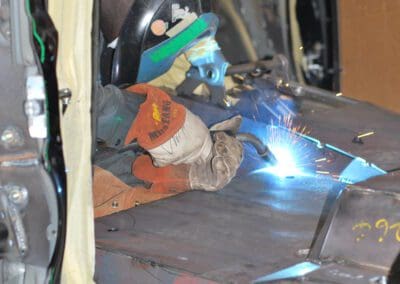 Person welding inside the car